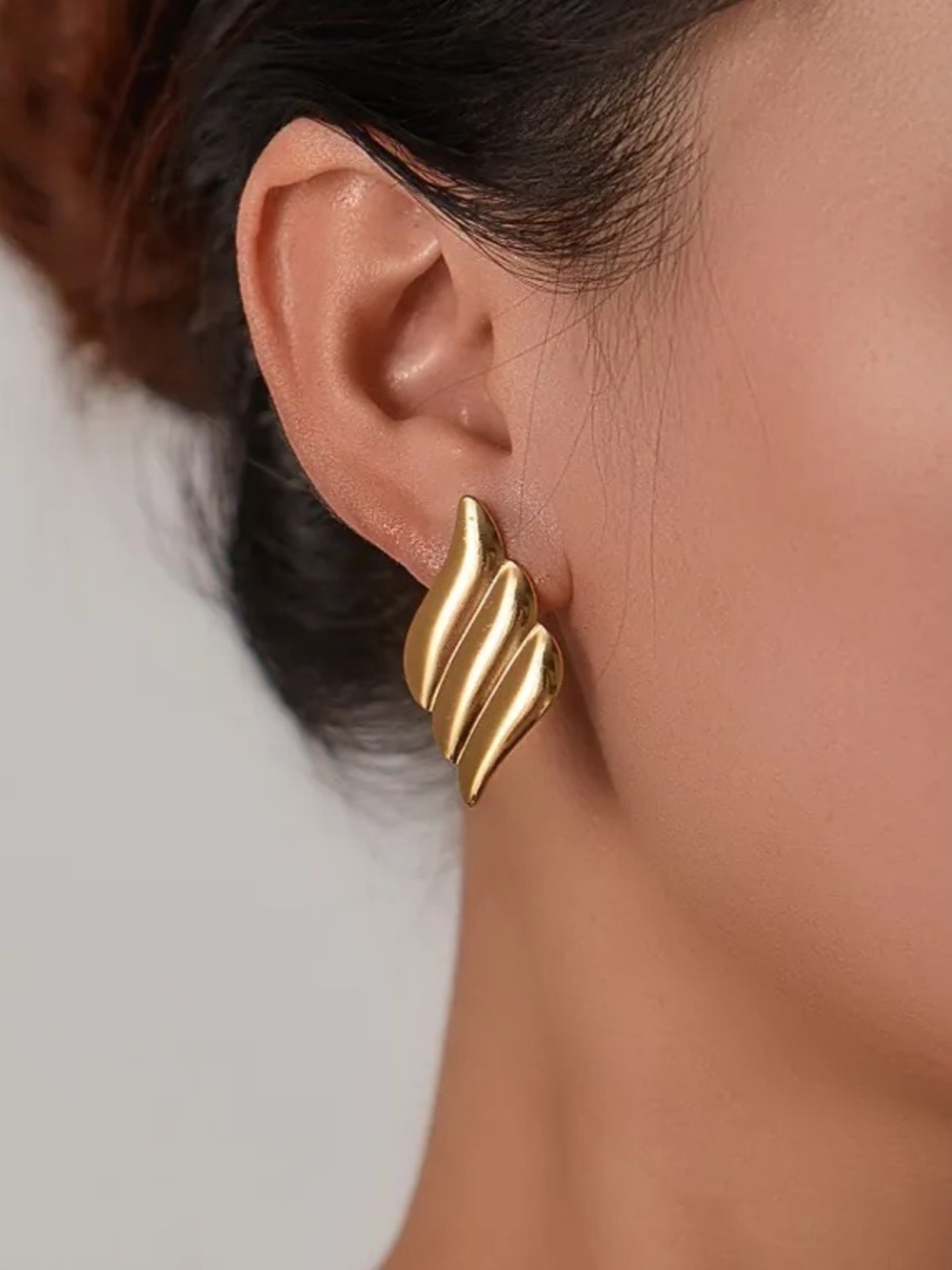 Gold Wave Leaf Stud Earrings.